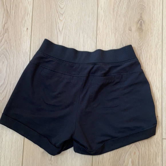 Athleta black shorts with 2 pockets in front and back and tie waist. Size 2 - Picture 3 of 3